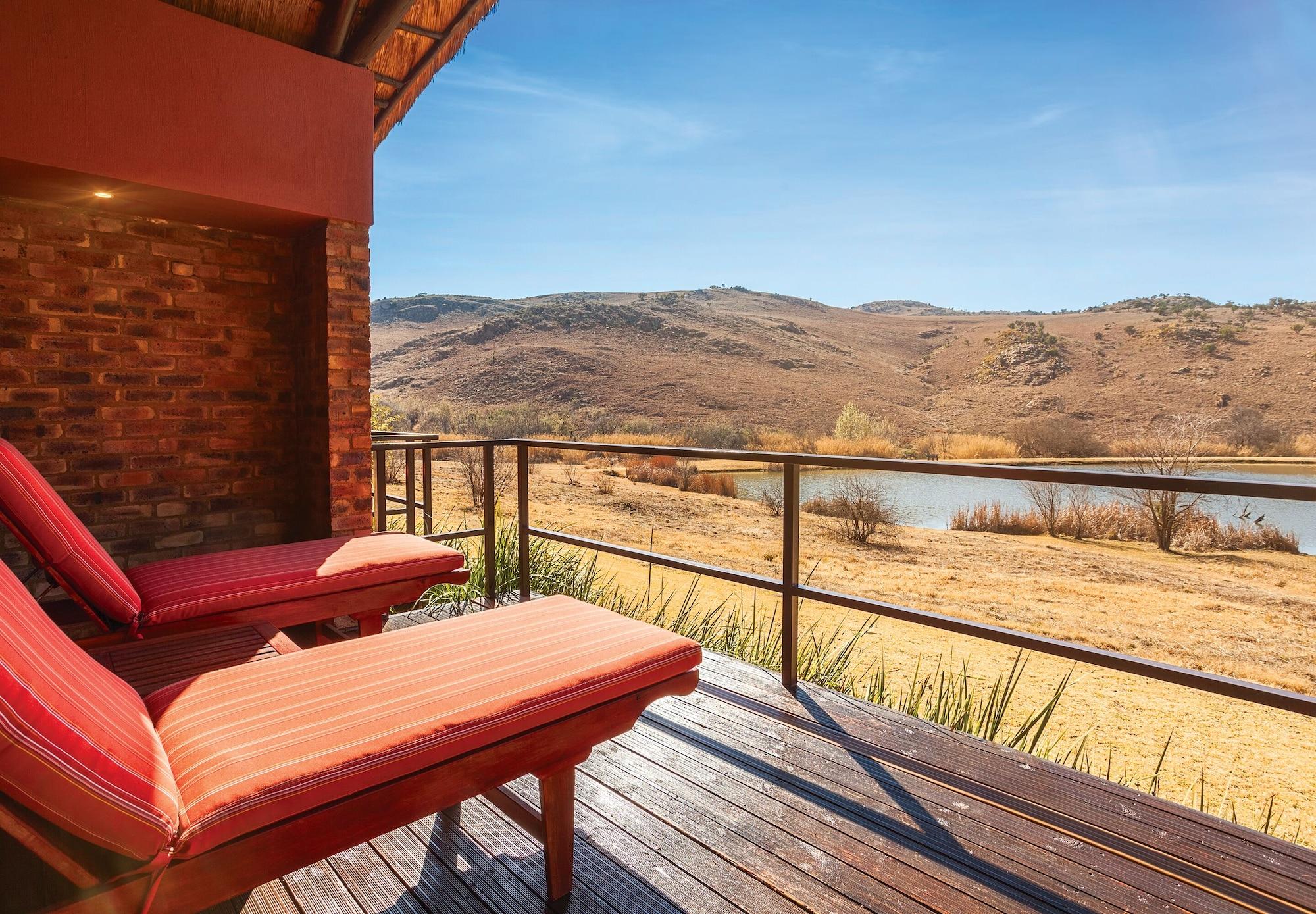 Kloofzicht Lodge & Spa Krugersdorp Kültér fotó View from the deck of a suite at the Tswalu Kalahari Reserve