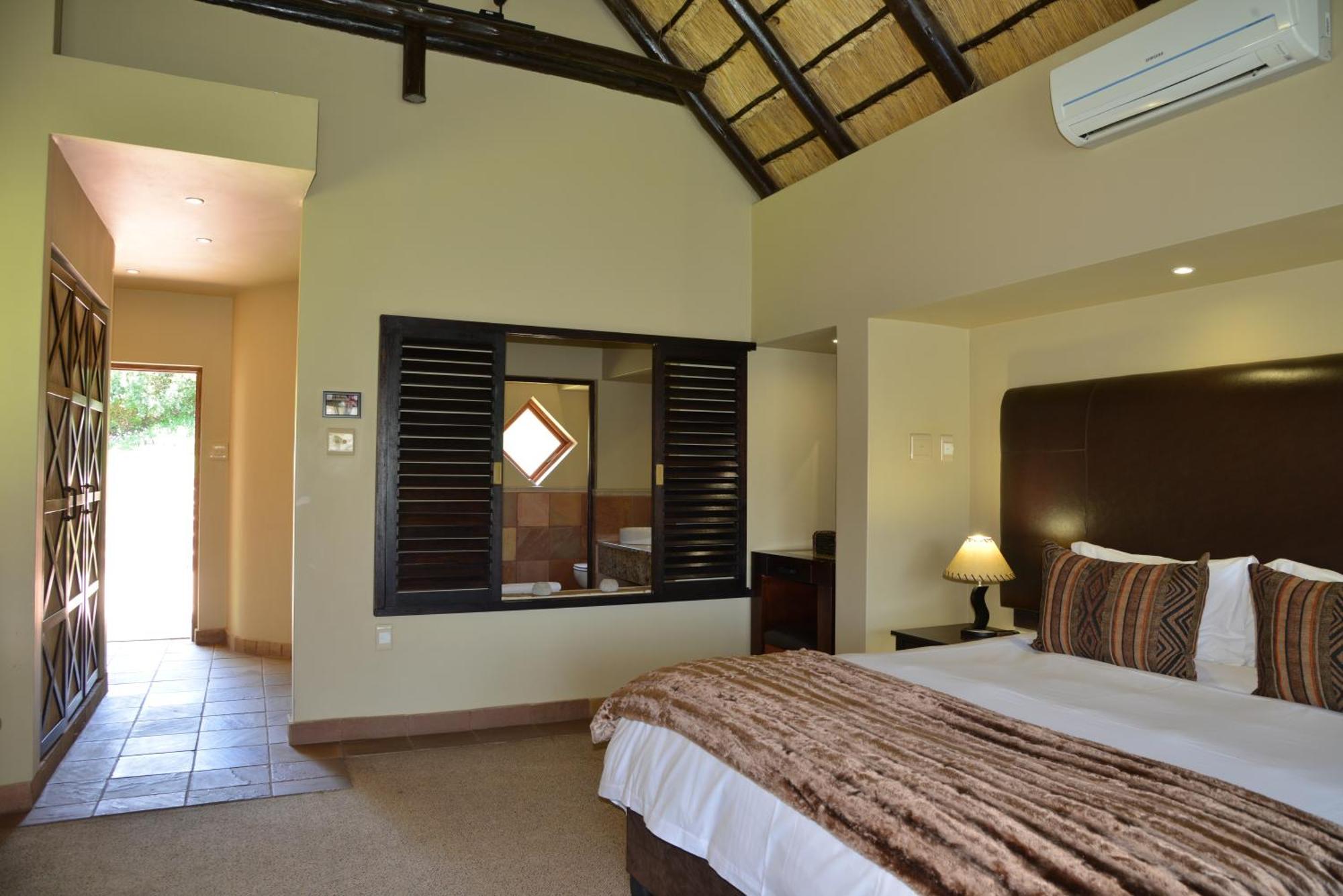 Kloofzicht Lodge & Spa Krugersdorp Szoba fotó A bedroom at the resort